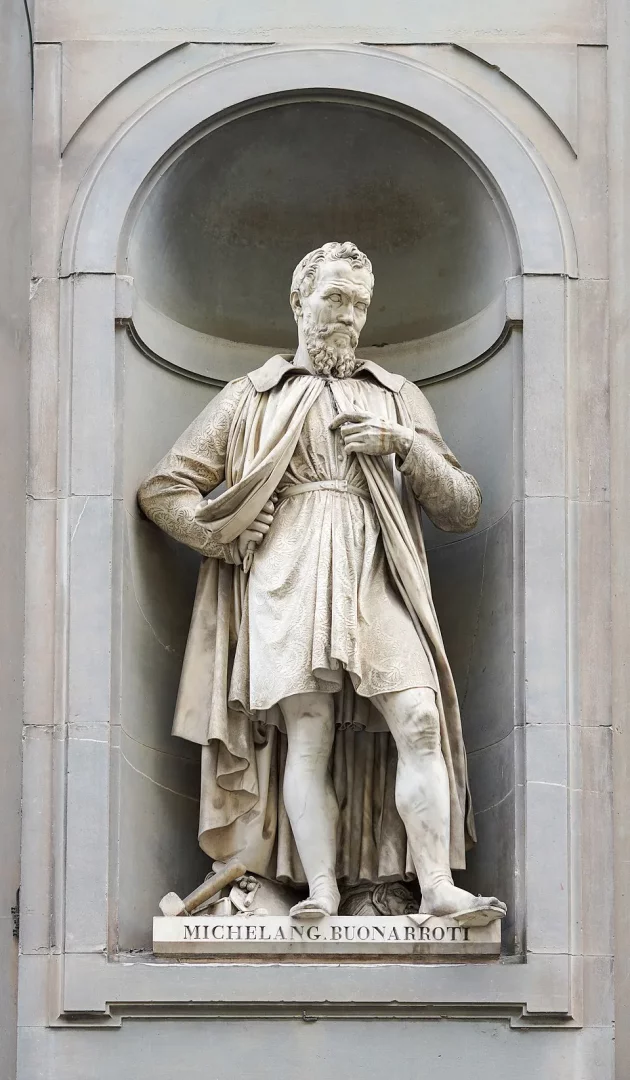 Uffizi Galerisi'nde bir niş içinde konumlanmış, sağ elini göğsüne götürürken sol elini beline dayamış, dökümlü pelerinli ve sakallı mermer Michelangelo heykeli, ayaklarının dibindeki heykel aletleri ve yontulmuş bir baş ile özenle tasvir edilmiştir.